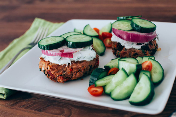 Double Time Family Recipes, Mediterranean Turkey Burgers with cucumber slices, red onions, and yogurt sauce