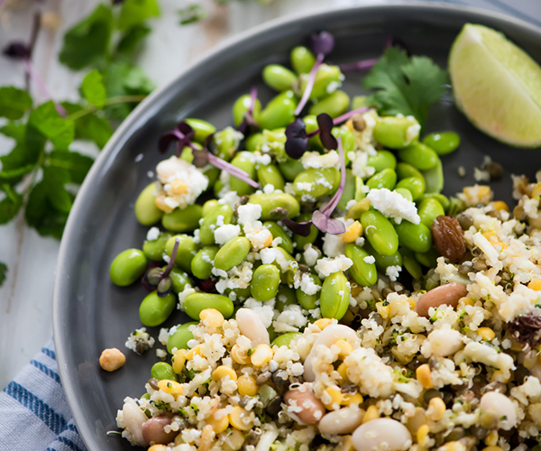 Healthy salad with edamame, beans, and grains