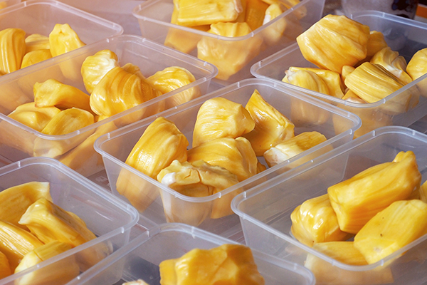 Sliced jackfruit in plastic trays