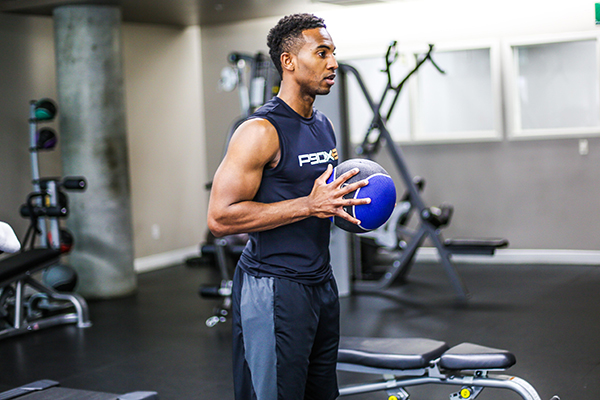 Man working out with a medicine ball