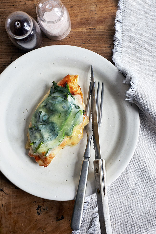 This classic Chicken Florentine is an homage to healthy eating with steamed spinach, juicy chicken breast, and savory part-skim mozzarella on top.