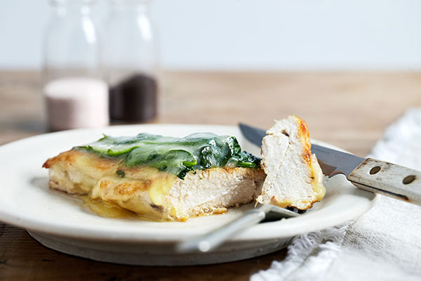 This classic Chicken Florentine is an homage to healthy eating with steamed spinach, juicy chicken breast, and savory part-skim mozzarella on top.