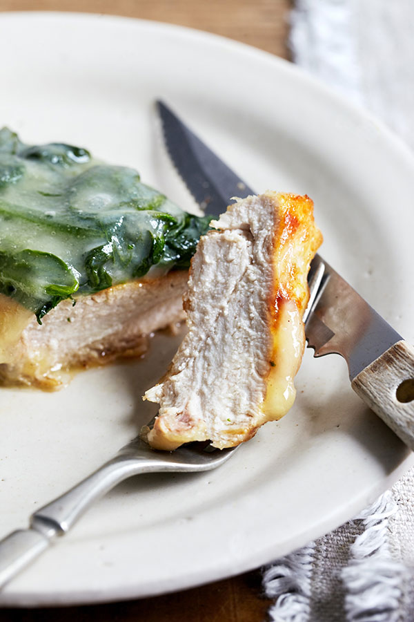 This classic Chicken Florentine is an homage to healthy eating with steamed spinach, juicy chicken breast, and savory part-skim mozzarella on top.