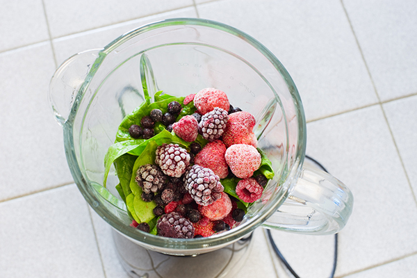 Frozen fruit in a blender