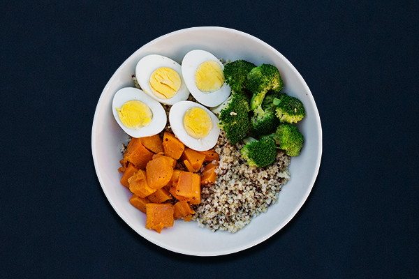 Pre-workout meals for 80 Day Obsession, pre-workout nutrition, pre-workout snacks, grain bowl with quinoa, broccoli, butternut squash, hard-boiled eggs
