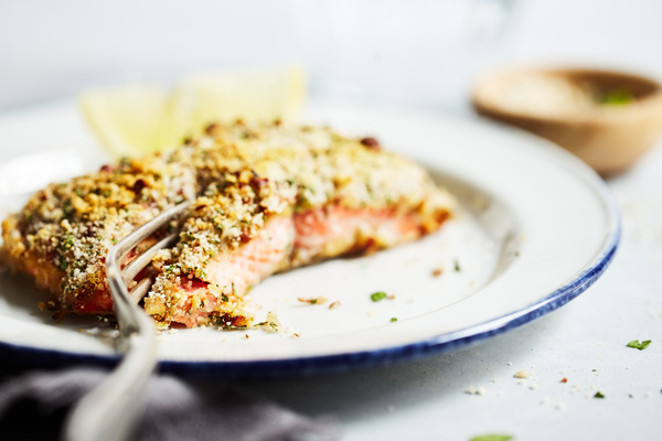 For an easy weeknight meal that's bursting with flavor try this Baked Salmon with Dijon featuring whole wheat bread crumbs, Dijon mustard, and raw honey.