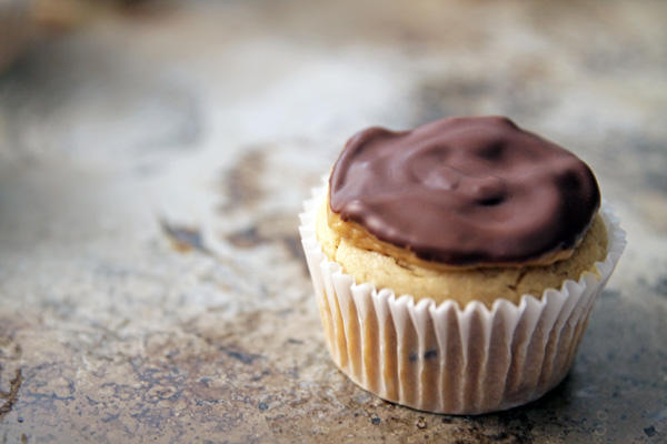 These healthier double Peanut Butter Cupcakes are ideal for your next party, featuring gooey bitter sweet chocolate chunks and all natural peanut butter.