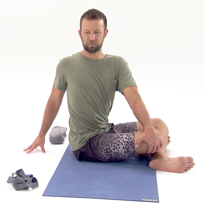 Seated twist back stretches - 3 Week Yoga Retreat