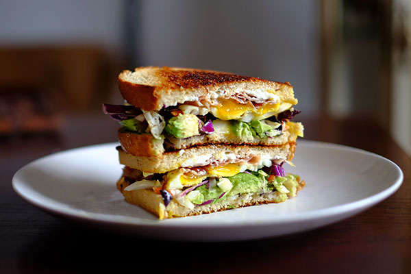 Sandwich with avocado and egg.