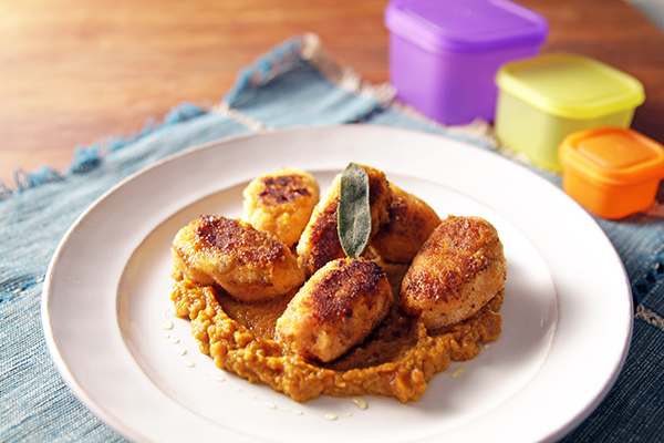 A plate of sweet potato gnudi in pumpkin sauce