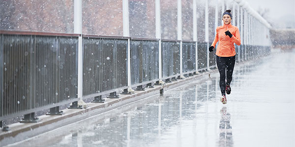 woman running in the rain