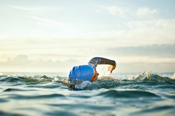 swimmer in ocean | Cardiorespiratory Endurance