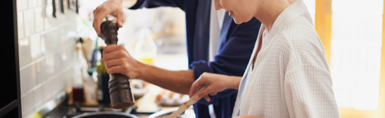 Young couple cooking