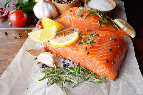 Salmon, spices in parchment paper