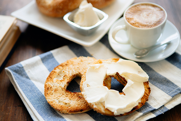 Bagels and crea cheese with latte