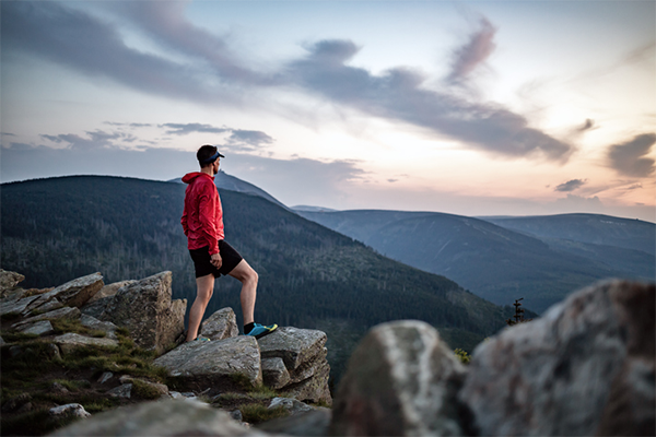 runner taking a rest and enjoying the view | Running Motivation