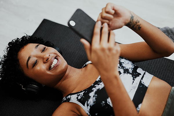 Happy woman listening to music