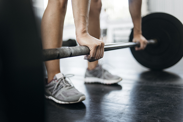 Woman lifting barbell