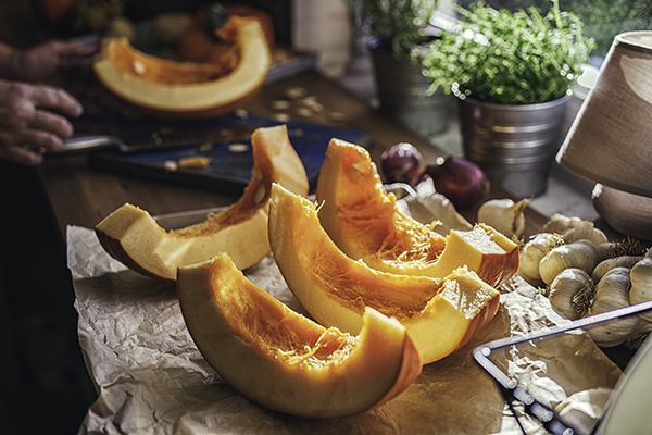 Cutting Fresh Pumpkins for Roasting in the Oven