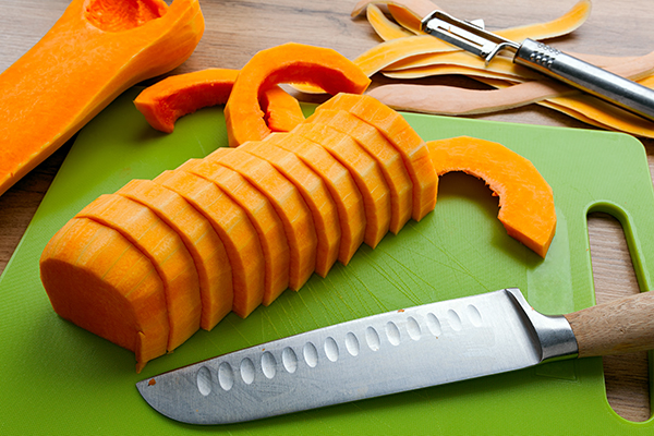 Sliced butternut squash on cutting board