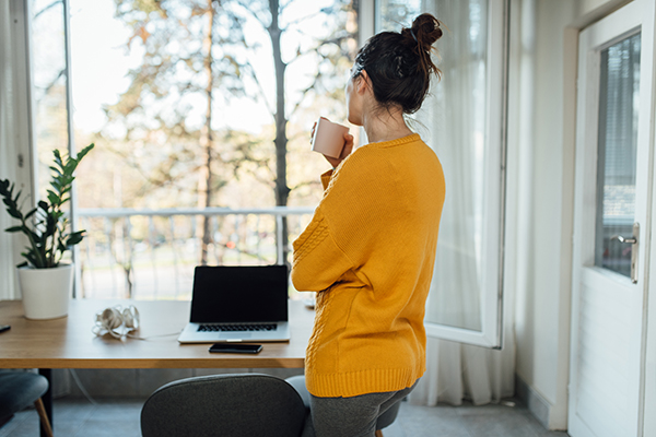 Woman taking a break from working at home