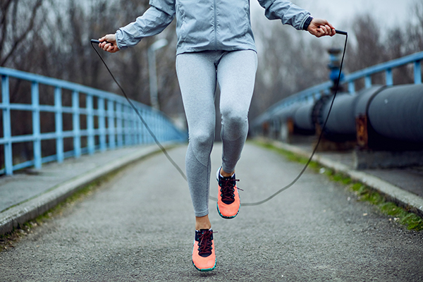 Woman jumping rope