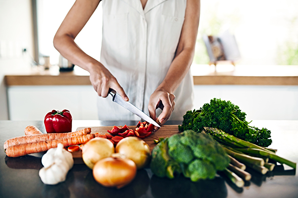 Woman chopping vegetables