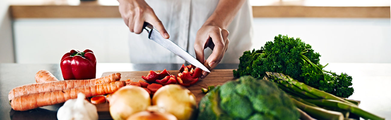 Woman chopping vegetables