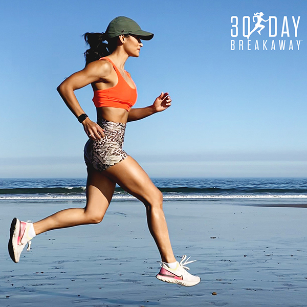 Idalis Velazquez running on a beach