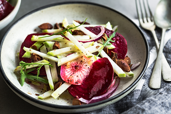 Sliced turnip with beets, radishes, onion