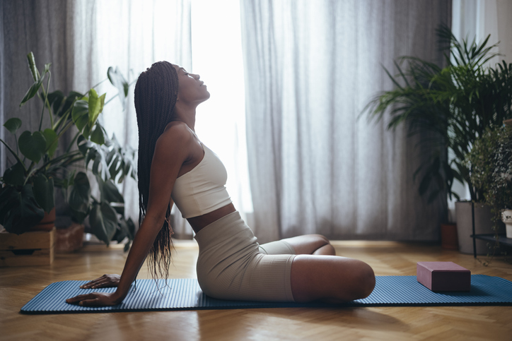 woman resting during yoga | How to Adjust to Time Change