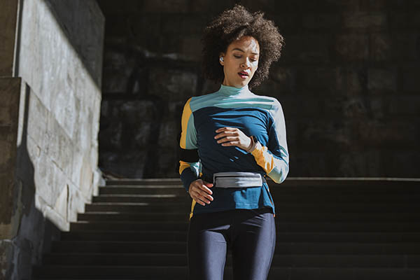 Female runner wearing running belt