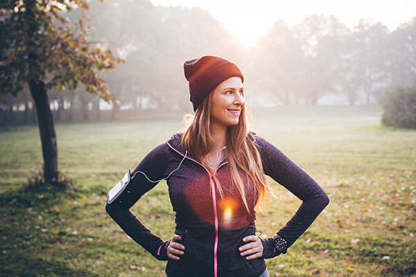 Woman feeling strong and fit after running outside