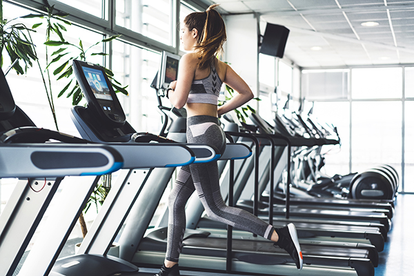 Woman running on treadmill