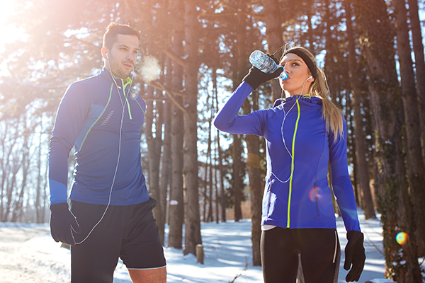 Couple running in winter