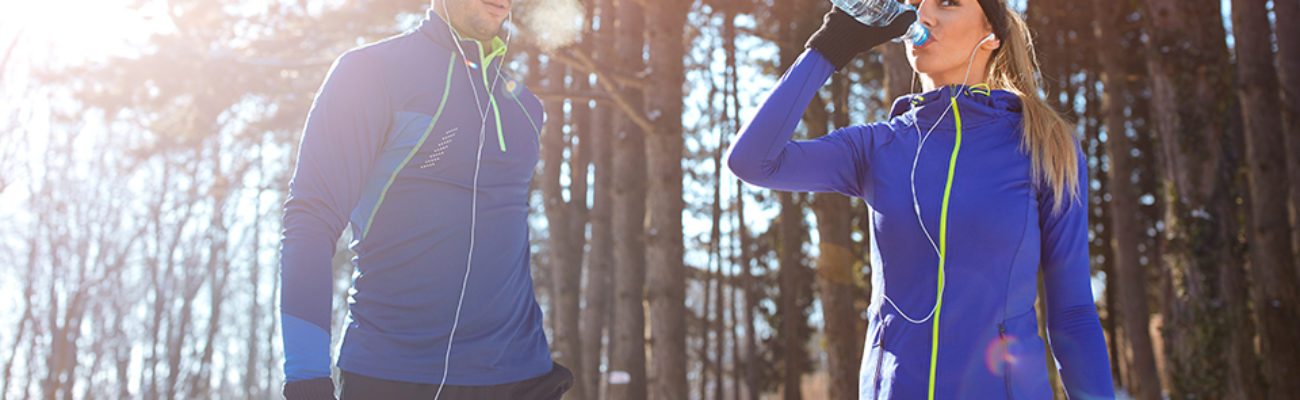 Couple running in winter