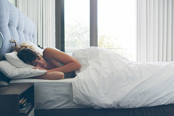 Woman sleeping in bed