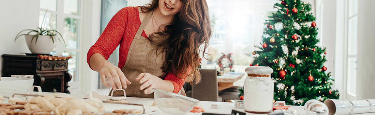 Woman making Christmas cookies