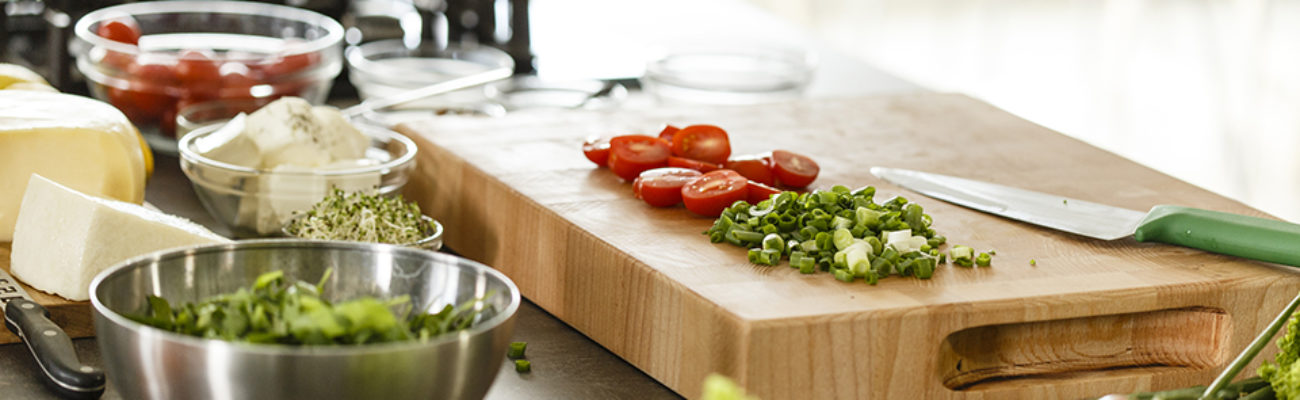 Chopped vegetables on wood cutting board