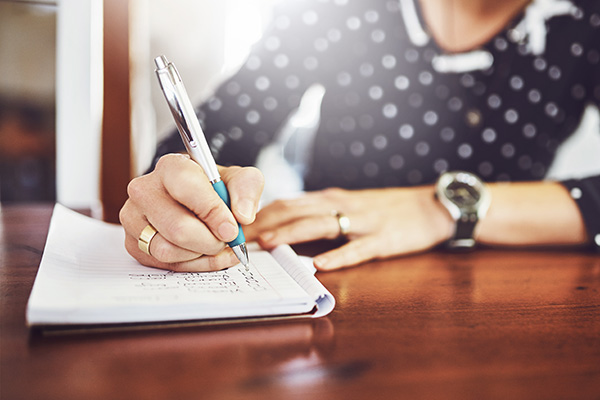 Woman making a to-do list