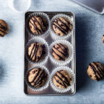 Banana Bread Energy Balls in a tin