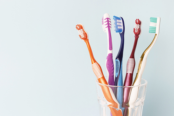 Toothbrushes in a glass