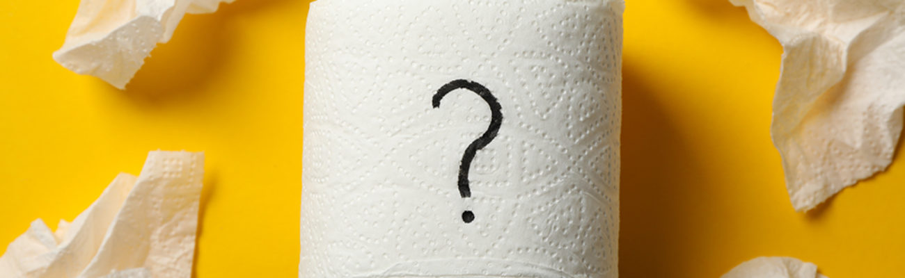 Toilet paper with question mark on yellow background