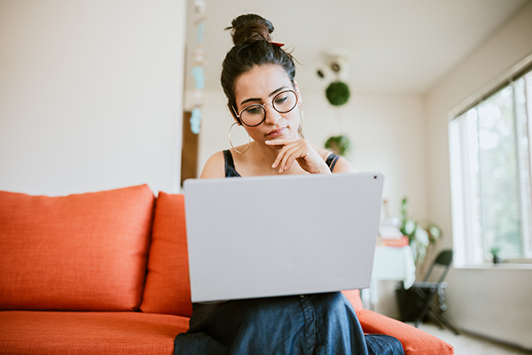 Woman working on laptop computer