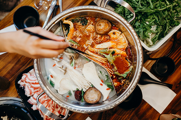 Hot pot meal on a table.