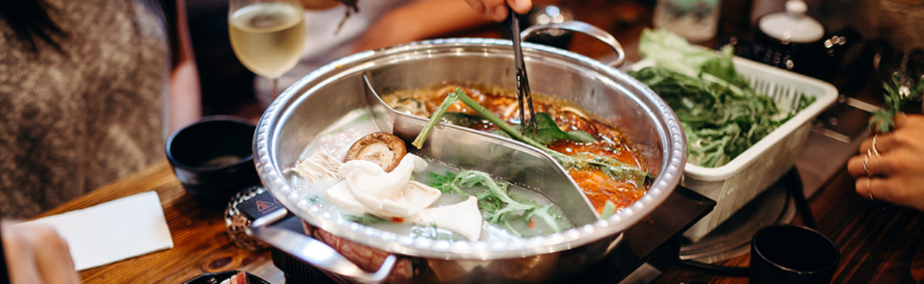 Hot pot meal on a table.