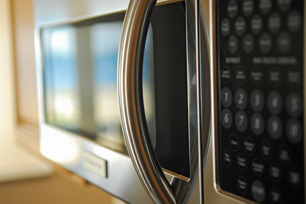 Close-up of microwave control panel