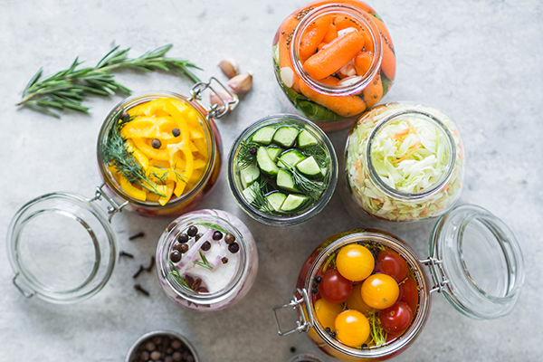 Pickled vegetables in glass jars