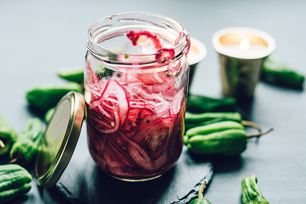 Pickled red onion in a jar