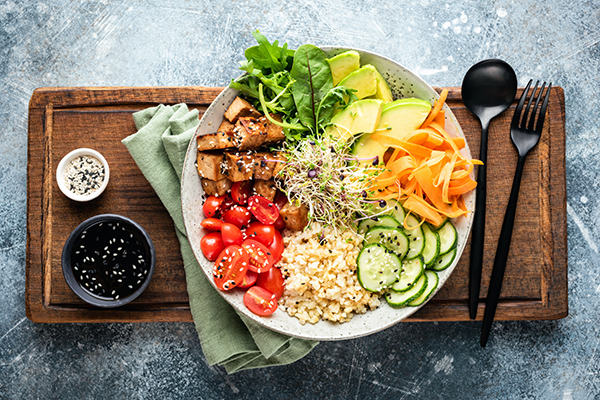 Protein bowl of mixed vegetables and grains.